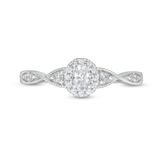 1/3 CT. T.w. Oval Diamond Frame Twist Shank Engagement Ring in 14K White Gold (I/Si2)