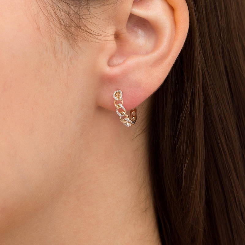 Main Image 2 of 1/10 CT. T.W. Diamond Curb Huggie Hoop Earrings in 10K Gold