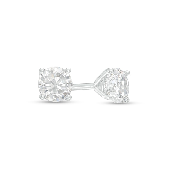 1/ CT. T.w. Diamond Solitaire Stud Earrings in 14K Gold (J/I3