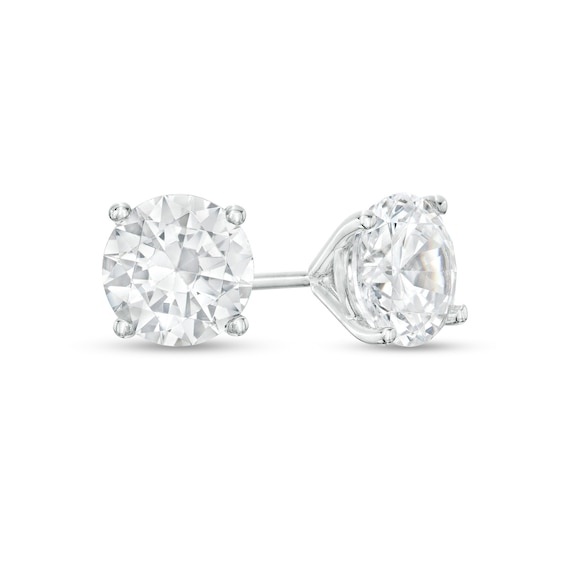 1/ CT. T.w. Diamond Solitaire Stud Earrings in 14K Gold (J/I2