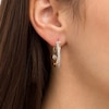 Thumbnail Image 2 of 1/2 CT. T.W. Diamond Crossover Hoop Earrings in 10K Gold
