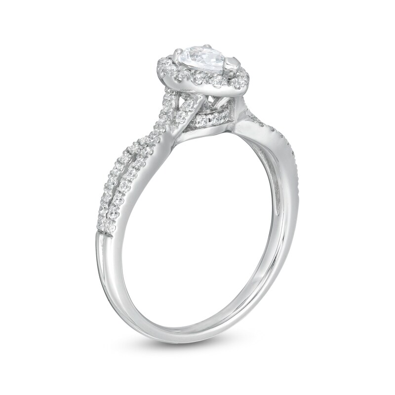 3/4 CT. T.W. Pear-Shaped Diamond Frame Twist Shank Engagement Ring in Platinum (I/SI2)