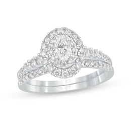 1 CT. T.W. Oval Diamond Frame Bridal Set in 10K White Gold