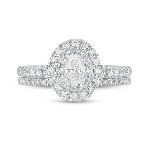 1 CT. T.w. Oval Diamond Frame Bridal Set in 10K White Gold