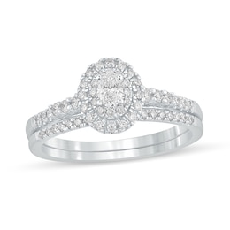 1/2 CT. T.W. Oval Diamond Frame Bridal Set in 10K White Gold