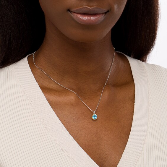 7.0mm Swiss Blue Topaz Solitaire Rope-Textured Frame and Drop Pendant in Sterling Silver and 10K Gold