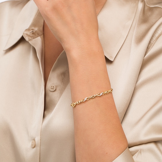 1/20 CT. T.w. Diamond Mom Infinity Loop Bracelet in Sterling Silver with 14K Gold Plate â 7.5"