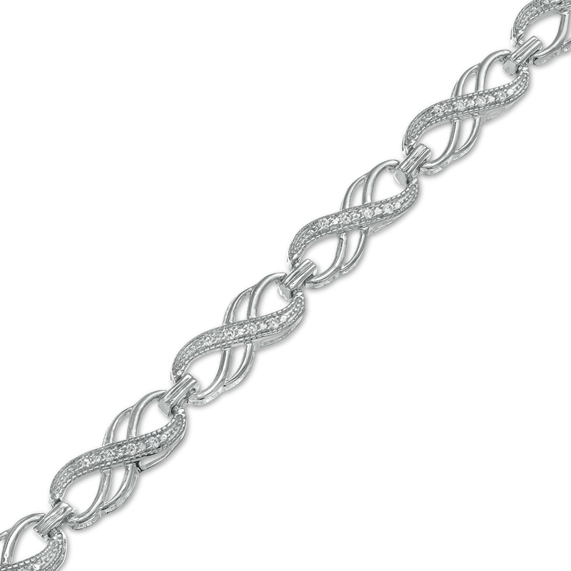 Main Image 1 of 1/4 CT. T.W. Diamond Double Infinity Loop Bracelet in Sterling Silver – 7.25"