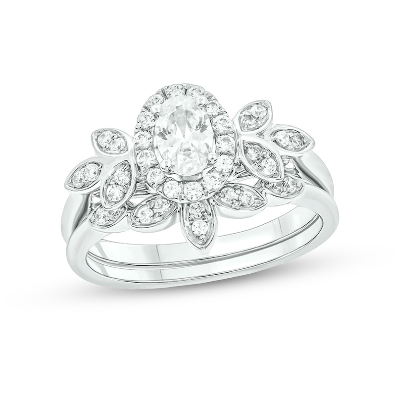 Main Image 1 of 3/4 CT. T.W. Oval Diamond Frame Tri-Sides Leaf Bridal Set in 14K White Gold (I/I2)