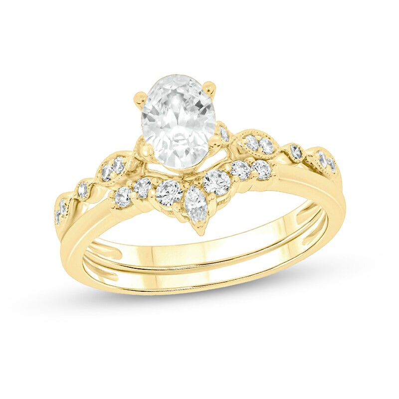 Main Image 1 of 3/4 CT. T.W. Oval Diamond Contour Vintage-Style Bridal Set in 14K Gold (I/I2)