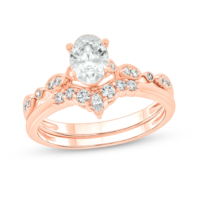 Main Image 1 of 3/4 CT. T.W. Oval Diamond Contour Vintage-Style Bridal Set in 14K Rose Gold (I/I2)