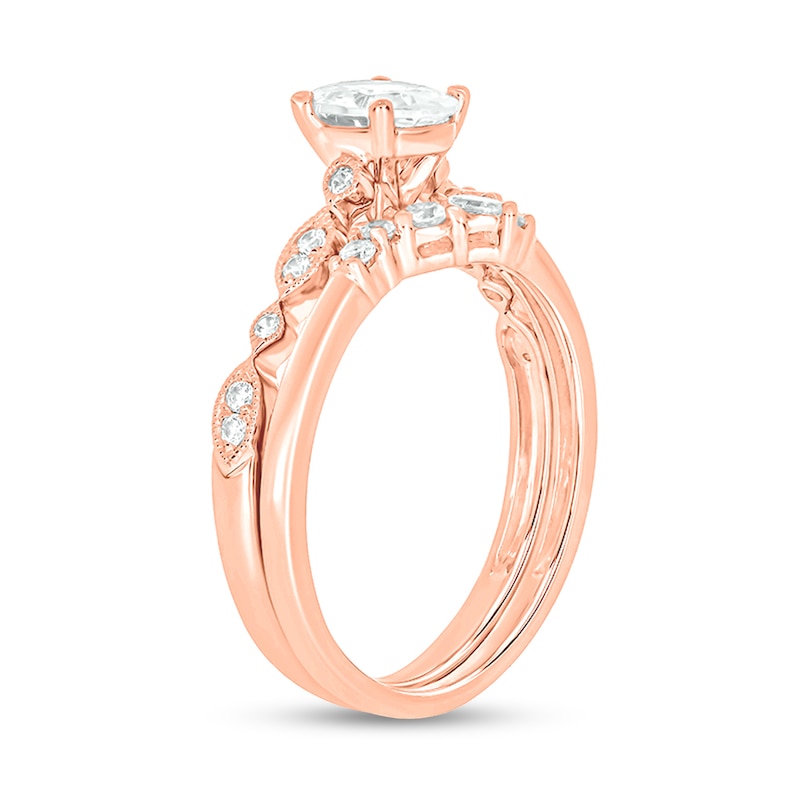 Main Image 2 of 3/4 CT. T.W. Oval Diamond Contour Vintage-Style Bridal Set in 14K Rose Gold (I/I2)