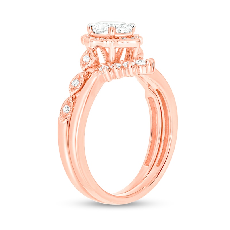 Main Image 2 of 3/4 CT. T.W. Oval Diamond Frame Vintage-Style Bridal Set in 14K Rose Gold (I/I2)