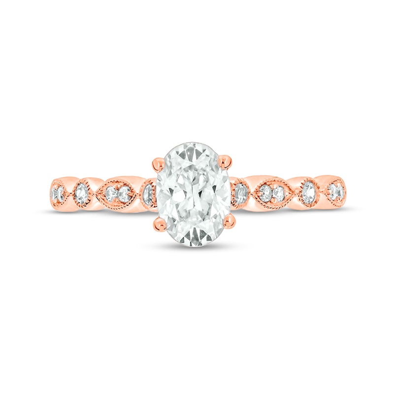 1 CT. T.W. Oval Diamond Vintage-Style Three Piece Bridal Set in 14K Rose Gold (I/I2)