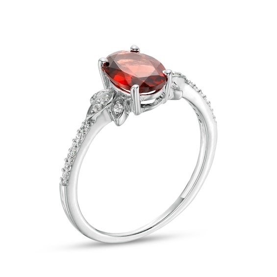 Oval Garnet and 1/10 CT. T.w. Diamond Leaf-Sides Floral Ring in 10K White Gold
