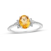 Thumbnail Image 0 of Oval Citrine and 1/10 CT. T.W. Diamond Leaf-Sides Floral Ring in 10K White Gold