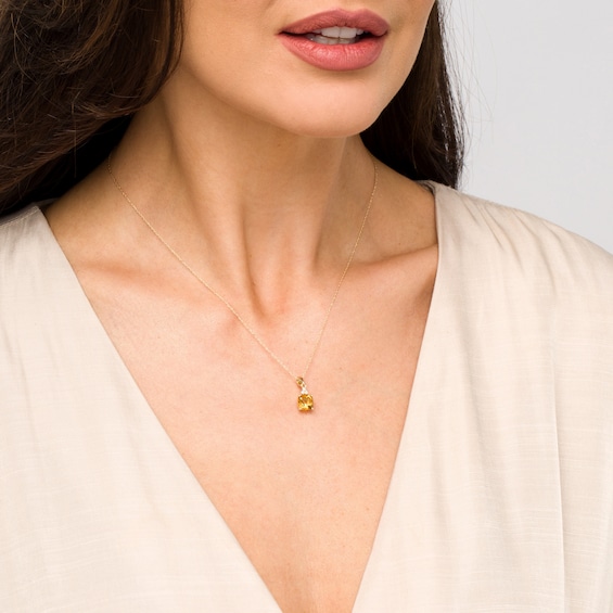 7.0mm Cushion-Cut Citrine and 1/20 CT. T.w. Diamond Tri-Top Drop Pendant in 10K Gold