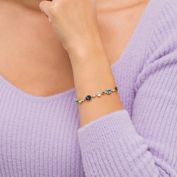 Multi-Shaped London, Swiss and Sky Blue Topaz Alternating Line Bracelet in 10K Gold - 7.25"