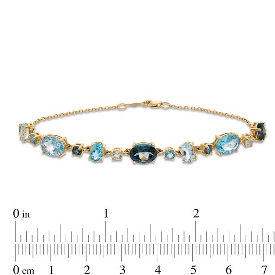 Multi-Shaped London, Swiss and Sky Blue Topaz Alternating Line Bracelet in 10K Gold - 7.25"