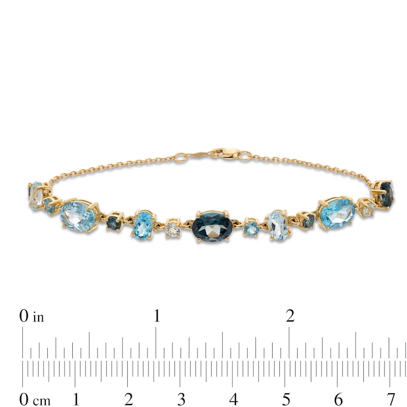 Main Image 4 of Multi-Shaped London, Swiss and Sky Blue Topaz Alternating Line Bracelet in 10K Gold - 7.25"