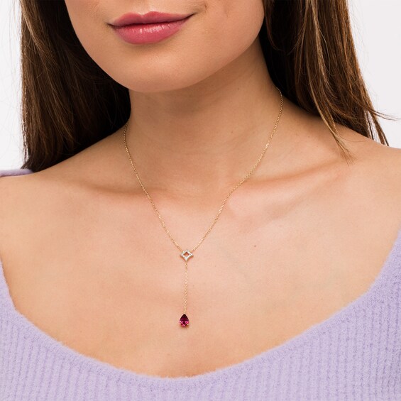 Pear-Shaped Rhodolite Garnet and 1/10 CT. T.w. Diamond Open Rhombus "Y" Necklace in 10K Gold