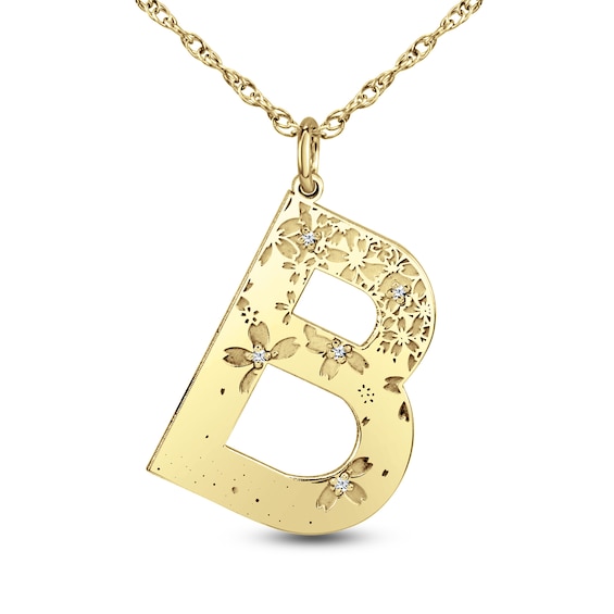 1/20 CT. T.w. Diamond Floral Initial Pendant (1 Initial)
