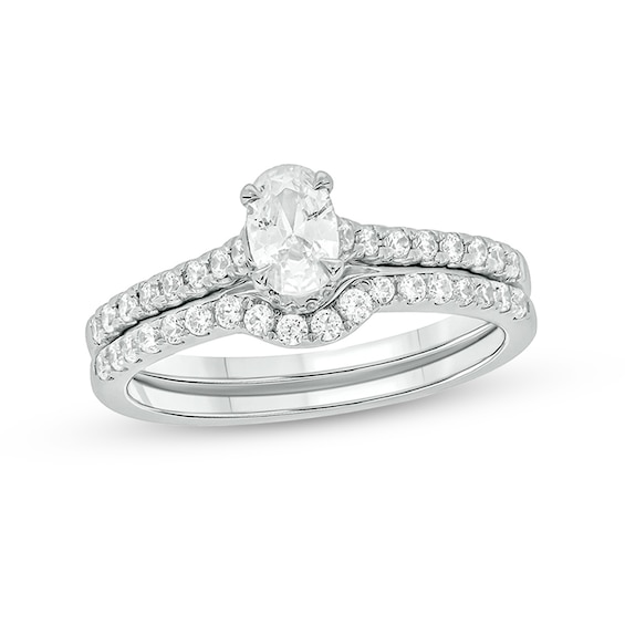 1 CT. T.w. Oval Diamond Bridal Set in 14K White Gold (I/I2)