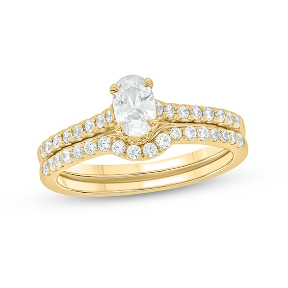 1 CT. T.w. Oval Diamond Bridal Set in 14K Gold (I/I2)