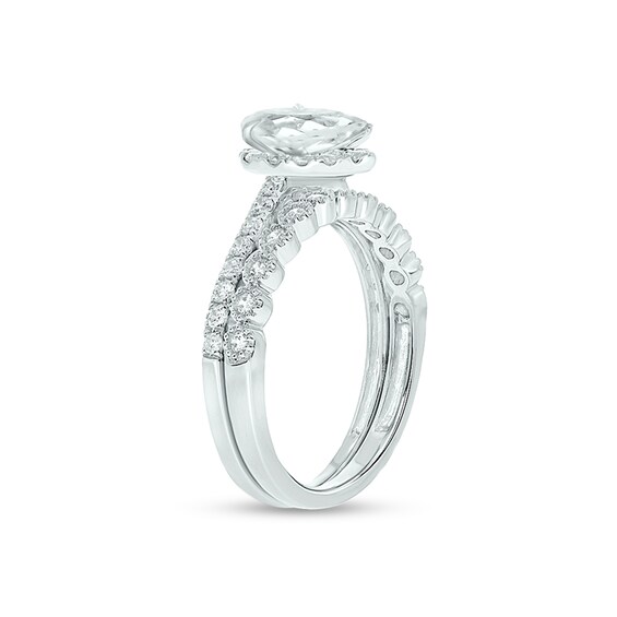 1 CT. T.w. Pear-Shaped Diamond Frame Bridal Set in 14K White Gold (I/I2)