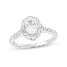 3/4 CT. T.W. Oval Diamond Flower Frame Vintage-Style Engagement Ring in 14K White Gold (I/I2)
