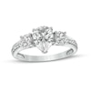 Thumbnail Image 1 of Pear-Shaped White Lab-Created Sapphire and 1/6 CT. T.W. Diamond Three Stone Engagement Ring in 10K White Gold