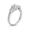 Thumbnail Image 2 of Pear-Shaped White Lab-Created Sapphire and 1/6 CT. T.W. Diamond Three Stone Engagement Ring in 10K White Gold