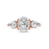 Thumbnail Image 4 of Oval White Lab-Created Sapphire and 1/6 CT. T.W. Diamond Frame Three Stone Engagement Ring in 10K Rose Gold