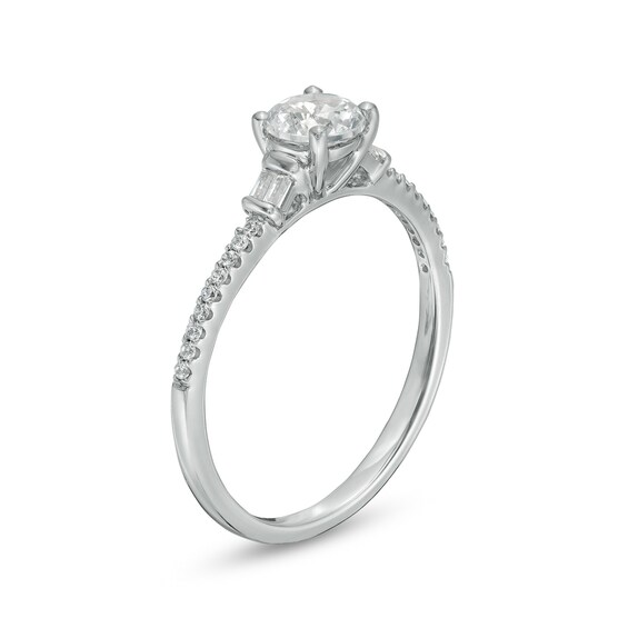 White Lab-Created Sapphire and 1/10 CT. T.w. Baguette and Round Diamond Side Accent Engagement Ring in 10K White Gold