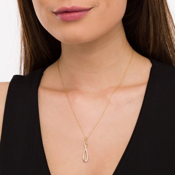 1/8 CT. T.w. Diamond Elongated Infinity Pendant in 10K Gold