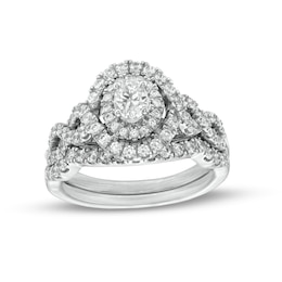 1 CT. T.W. Oval Diamond Double Frame Twist Shank Bridal Set in 14K White Gold