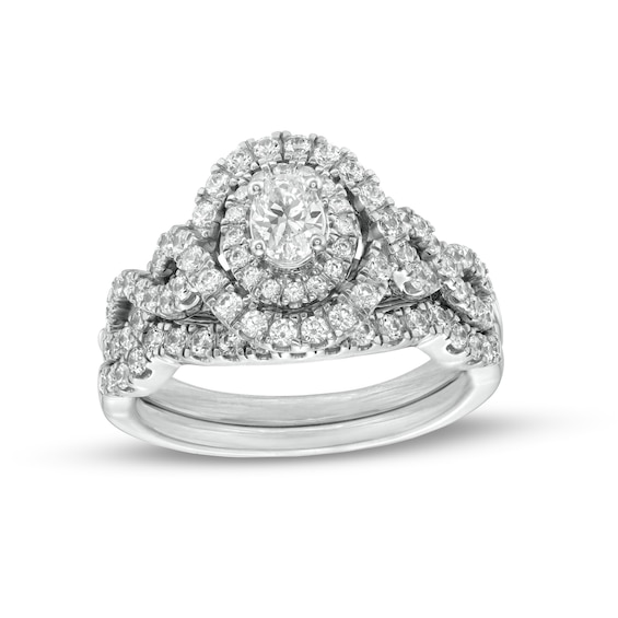 1 CT. T.w. Oval Diamond Double Frame Twist Shank Bridal Set in 14K White Gold
