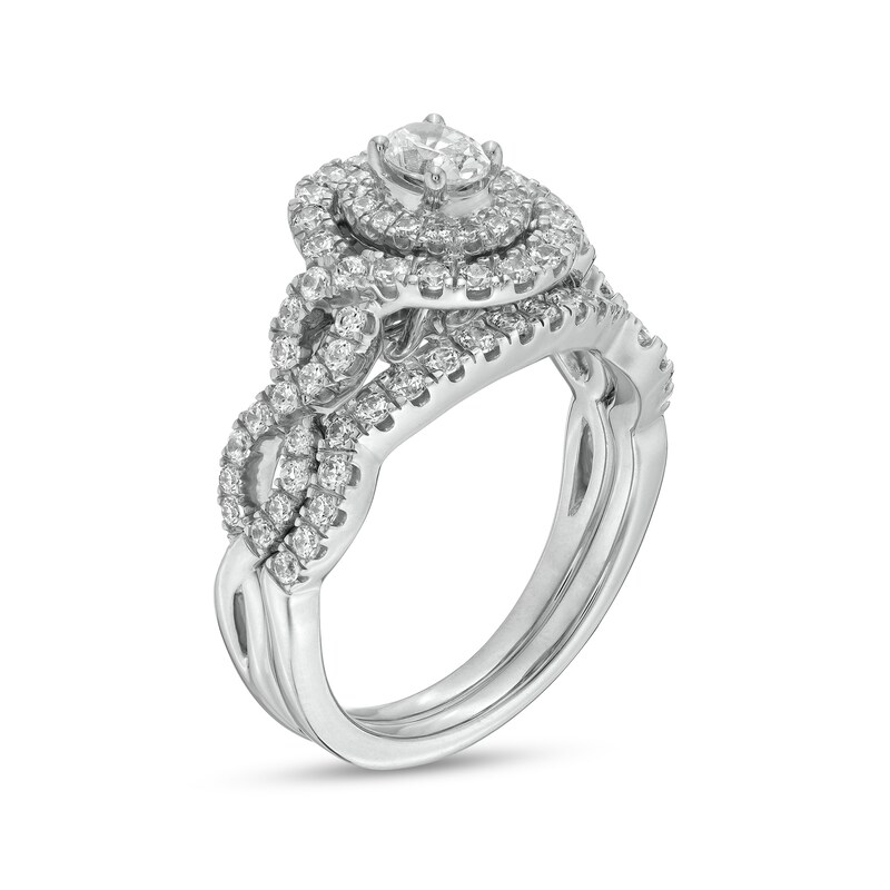 Main Image 3 of 1 CT. T.W. Oval Diamond Double Frame Twist Shank Bridal Set in 14K White Gold