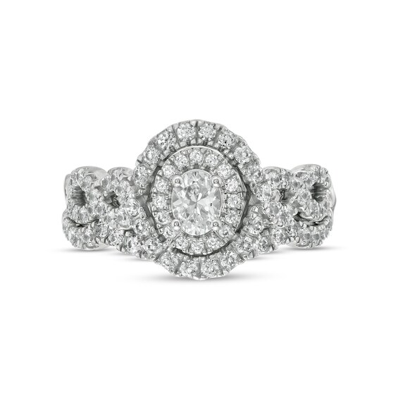 1 CT. T.w. Oval Diamond Double Frame Twist Shank Bridal Set in 14K White Gold