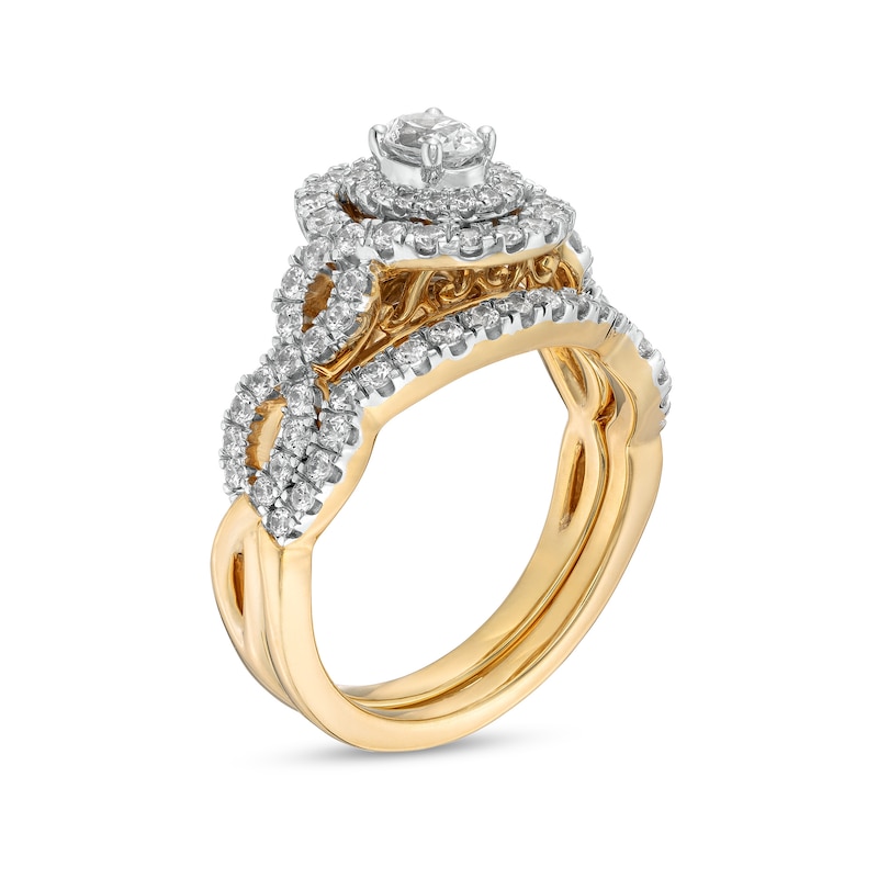 Main Image 3 of 1 CT. T.W. Oval Diamond Double Frame Twist Shank Bridal Set in 14K Gold