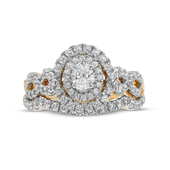 1 CT. T.w. Oval Diamond Double Frame Twist Shank Bridal Set in 14K Gold