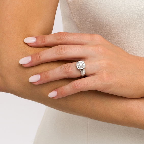 1-1/2 CT. T.w. Certified Diamond Cushion-Shaped Double Frame Split Shank Bridal Set in 14K White Gold (I/I2)