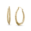 Thumbnail Image 1 of 26.06mm Diamond-Cut Knife Edge Tube Oval Hoop Earrings in 10K Gold