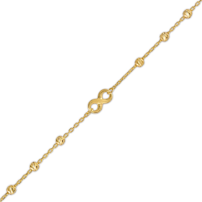 Diamond-Cut Infinity and Brilliance Bead Station Bracelet in 10K Gold - 7.5"