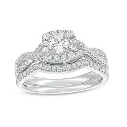 3/4 CT. T.W. Certified Diamond Cushion-Shaped Frame Twist Shank Bridal Set in 14K White Gold (I/I2)