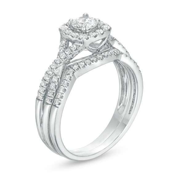 3/4 CT. T.w. Certified Diamond Cushion-Shaped Frame Twist Shank Bridal Set in 14K White Gold (I/I2)
