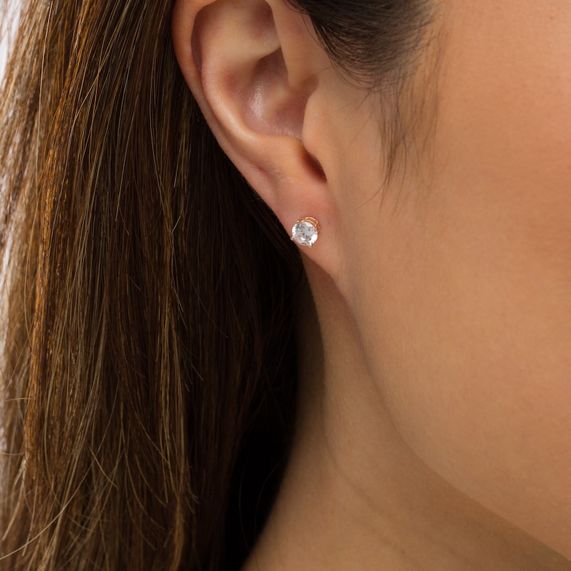 Main Image 2 of 1 CT. T.W. Diamond Solitaire Stud Earrings in 14K Rose Gold (I/I2)