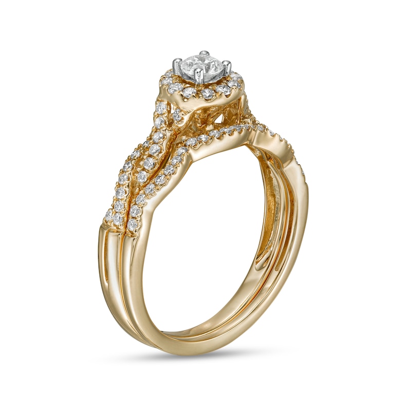 Main Image 3 of 1/2 CT. T.W. Diamond Frame Twist Shank Bridal Set in 10K Gold (I/I2)