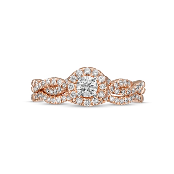 1/2 CT. T.w. Diamond Frame Twist Shank Bridal Set in 10K Rose Gold (I/I2)
