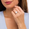 Thumbnail Image 1 of Cushion-Cut White Lab-Created Sapphire and 1/5 CT. T.W. Diamond Ornate Frame Vintage-Style Ring in 10K White Gold